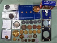 Collection of tokens, counterfeit coins, cases, et