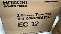New sealed Hitachi twin tank air compressor