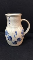Hand painted pottery pitcher
