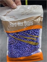 Hard wax beans used for hair removal - lavender