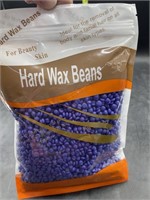 Hard wax beans used for hair removal - lavender