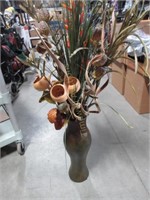 Faux plants in vase