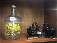 Mountain Dew jug and book ends
