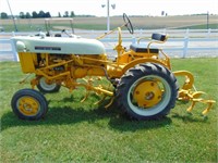 Farmall Cub with fast hitch plow/cultivators, 1964