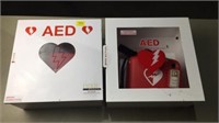 2 AEDs with cabinets