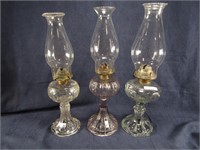 THREE GLASS PEDESTAL OIL LAMPS, TALLEST 17"