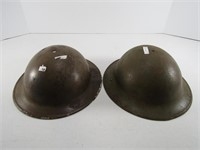 TWO ANTIQUE METAL ARMY HELMETS