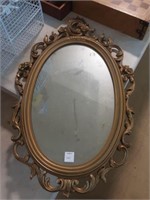 Oval wall mirror