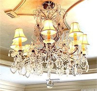 CRYSTAL & GILT METAL EIGHT LIGHT CHANDELIER