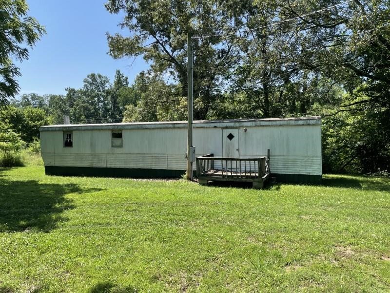 2.5 Ac with SW Mobile Home & Support Buildings