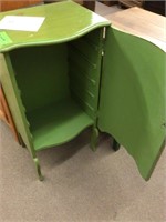 Green shelfless record cabinet