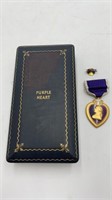 Purple Heart medal in case (Irving Yusin)