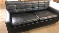 Kroehler leather couch with pull out bed.