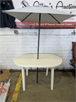 Patio table with Umbrella 
• table - 35" x 53" x