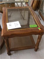 glass top caned bottom table