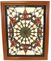 Stained glass panel in frame