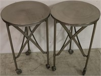 Pair metal round stands by Butler Specialty