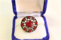 Antique sterling ring with red gem stones