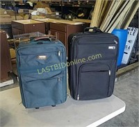2 smaller rolling suitcases