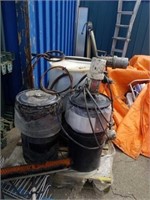 Barrels of undercoating with three electric pumps