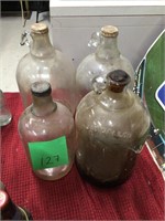 3- 1 gallon + 1/2 gal jugs 1 w/cork lot