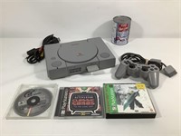 Console Playstation, manette & 3 jeux