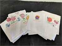 Group of hand embroidered kitchen towels