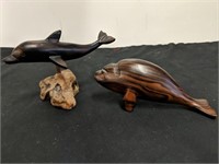 (2) ironwood dolphin figures