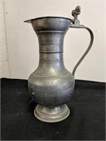 Heavy pewter pitcher with unusual markings