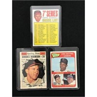 Three 1961-1965 Brooks Robinson Cards