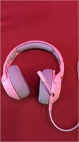 2 pink Onikuma gaming headphones