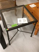 glass topped metal table