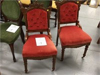 pair of red sitting chairs
