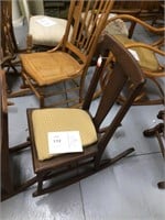 wood rocking chair and cushion