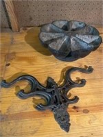 Cast iron hat hook and tray. Hat rack measures 9