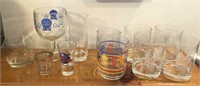 Large collection of bar glasses & NASA Shot Glass