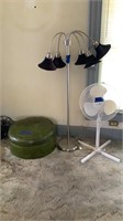 Leather ottoman, lamp, and fan