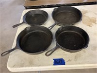 lg Griswold and 2 unmarked cast irons, #9