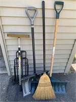 Two snow shovels, cart, Squeegee, & broom.