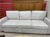 BEIGE SOFA WITH NAIL HEAD TRIM ,SRP $699.00