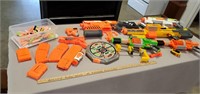 Assortment of Nerf Guns and Accessories