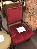 Antique red upholstered chair