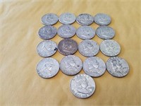 17 circulated Franklin half dollars-