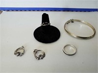 Two rings, earrings and bracelet all marked .925