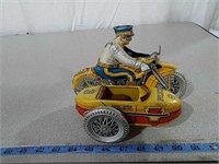 Vintage wind-up Marx police motorcycle with
