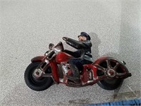 Vintage cast iron motorcycle and Rider.