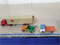 3 vintage trucks all marked Dinky toys