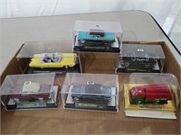 Collectible cars in plastic cases most are M2