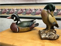 2 duck figurines