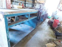 GREEN WORK BENCH 16 FT LONG WITH 2 BLACK SMITH